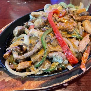 These are the Shrimp, Beef, &amp; Chicken fajitas. There are onions, green @&amp; red peppers tossed in a flavorful sauce.