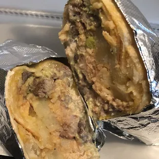 California burrito. Carne asada, (tender), cheese guacamole., sour cream, beans and fries.