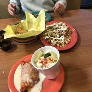 asada enchilada, cup of corn, queso fries