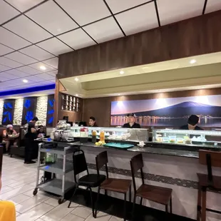 a woman sitting at the counter
