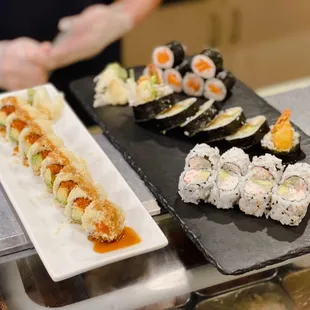 a plate of sushi and another plate of sushi