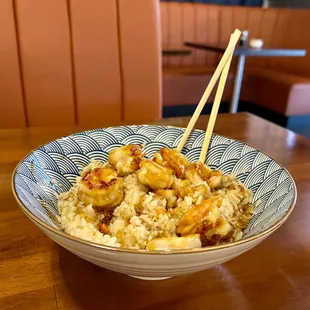 a bowl of rice and shrimp