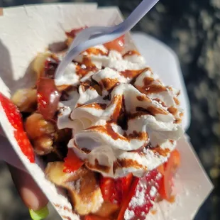 a person holding a fork in their hand