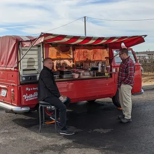 two men at a food truck