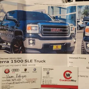 Dealership website vehicle description. Sales manager Aaron and sales associate Raven.