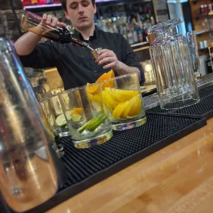 a bartender mixing a drink