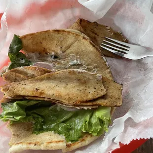 Chicken gyro. Delicious I could've used a little bit more tzatziki and maybe another piece of Romaine.