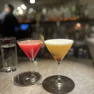 two cocktails on a bar counter