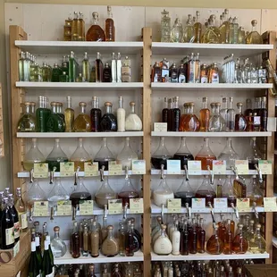 a shelf full of bottles and jars