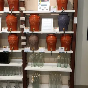 a display of vases and jars