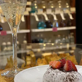 a dessert and a glass of wine