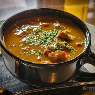 a bowl of soup on a plate