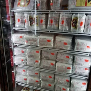 a display of packaged meat