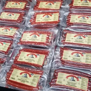 packaged sausages on a conveyor belt