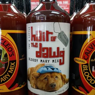 three bottles of hot sauce