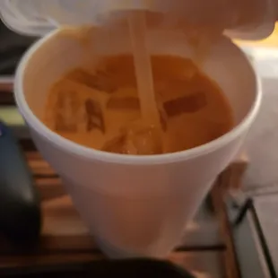 Thai coffee, tastes like a chai tea latte for comparison.