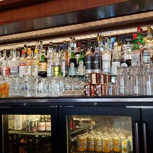 a bar full of liquor bottles