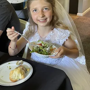 The happy First Communicant enjoying her lunch!
