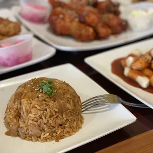 a plate of fried chicken and rice