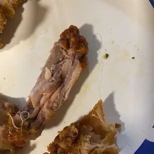 Hair in the breading of the chicken and the chicken meat was pink...