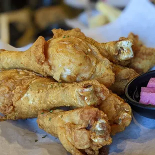 fried wings with a side of watermelon