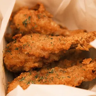 fried chicken in a paper bag