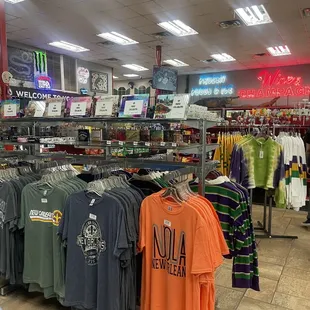 a variety of t - shirts on display