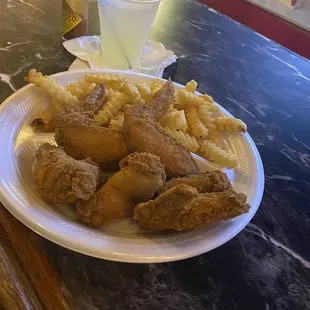 Chicken wings and fries