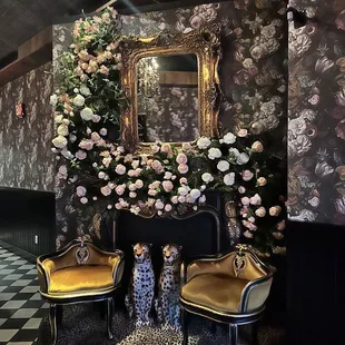 Secret FLOWER WALL!  Sit here, spin around into their restaurant next door!