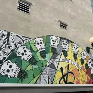 Painting on the building out on the patio