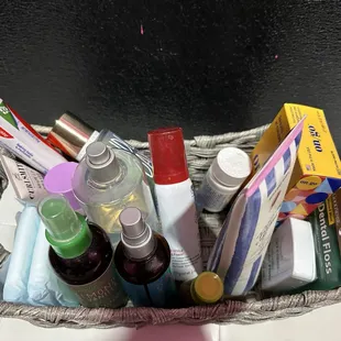 Weird basket of stuff in ladies restroom. Covid test? Dental floss? Toothpaste? Shaving cream? Lol