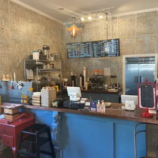 a counter with a laptop on it