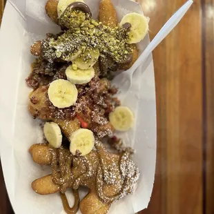Pistachio, dulce de leche and Elvis beignets