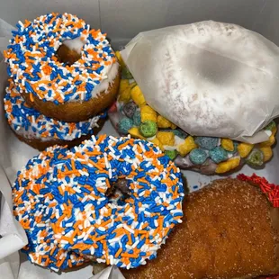 Astros World Series mini donuts, rhe blunt donut, oh captain my captain and a powdered sugar cake donut