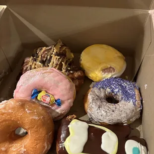 a variety of donuts in a box