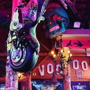 a motorcycle hanging from the ceiling