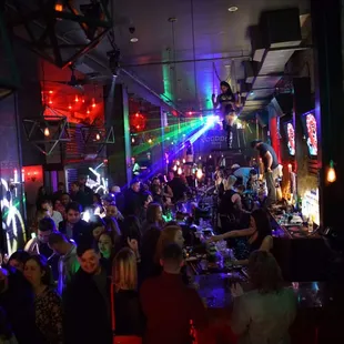 a group of people at a bar