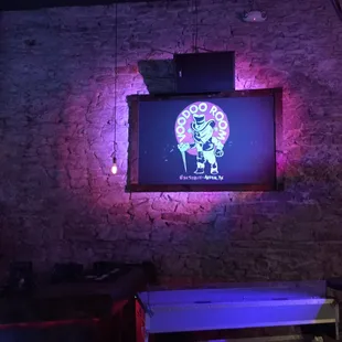 a neon skull on the wall