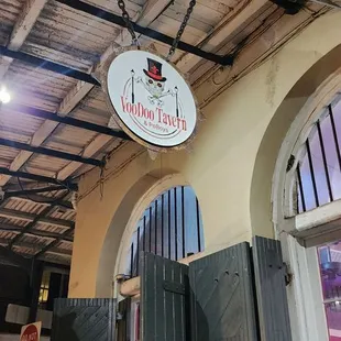 a sign hanging from the ceiling