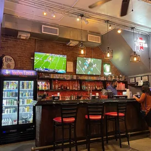 a man sitting at the bar