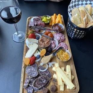 Texas charcuterie board + Brie because it&apos;s my favorite. Tannat from Bending Branch.