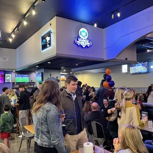 a large group of people at a party