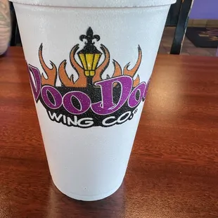 a plastic cup on a table