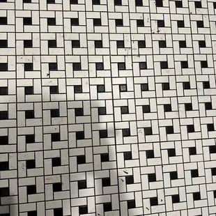 a black and white tiled floor