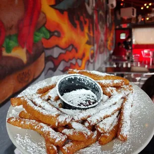 a funnel of powdered sugar on a plate