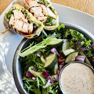 Chicken on wrap and side salad