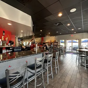 a view of the bar and dining area