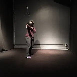 Fighting zombies. The photo doesn't capture her screams.