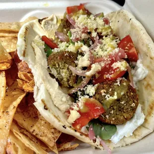 Falafel sammich! So Chef Amin's Persian falafel is so good. He ferments the chickpeas for a week to make them more creamy and dense.