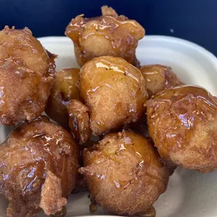 Pineapple andagi with pineapple caramel sauce